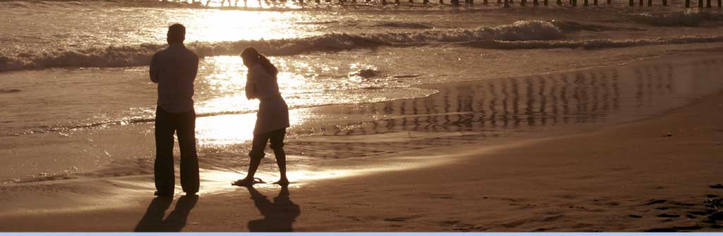 Photo of couple on the beach